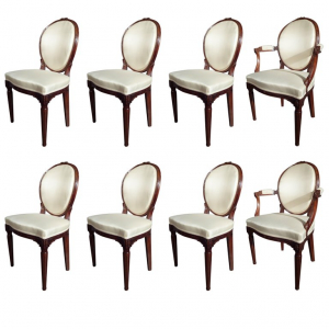 Een set van zes Louis XVI stoelen en twee fauteuils