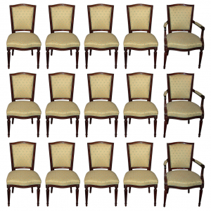 A set of twelve Dutch Louis XVI chairs and three fauteuils