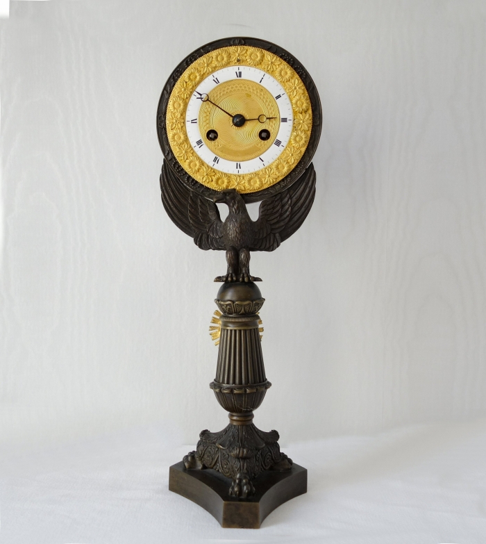 Eagleclock, powerful symbolism in gilt and patinated bronze, Charles X