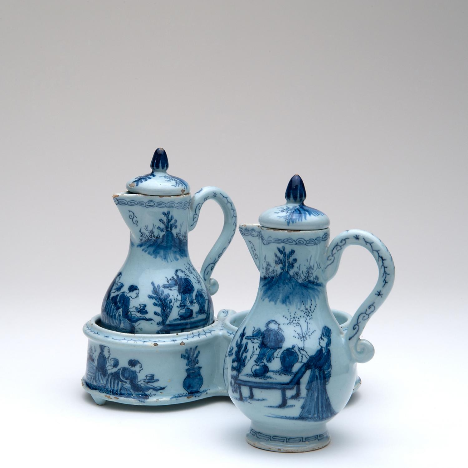 An Oil and Vinegar Set in Blue and White Dutch Delftware. Approximately