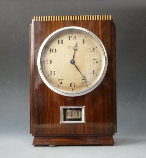  Atmos clock, wooden case, coromandel veneers and ivory, J.L. Reutter, model LG I, France circa 1930. 
