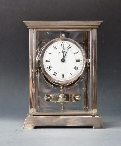 Atmos clock, nickel case J. L. Reutter, no 3499, France ca. 1930. 