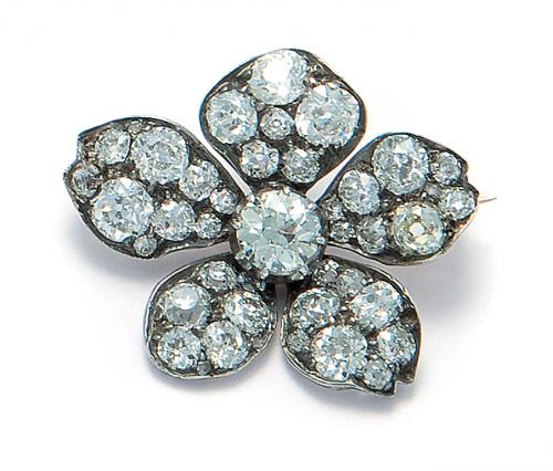 Brooch set with antique-cut diamonds.
