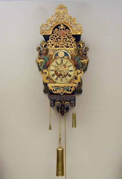 A large Dutch Frisian polychrome 'stoelklok' with moonphase and date by Jurriaan Greve