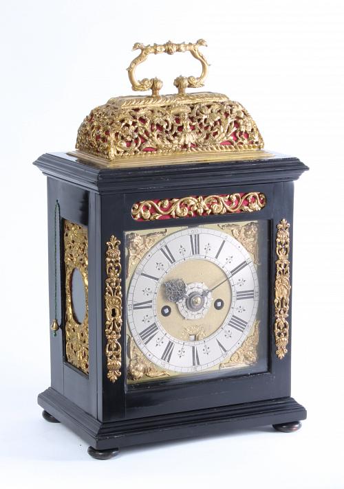 A rare and good Dutch ebony basket top alarm table clock with quarter repeat by Joseph Norris Amsterdam, circa 1690.
