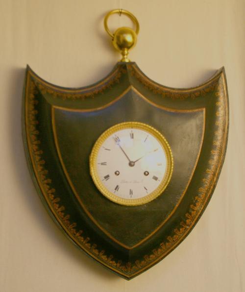 Hartshaped metal painted wall clock 8 day striking on bell