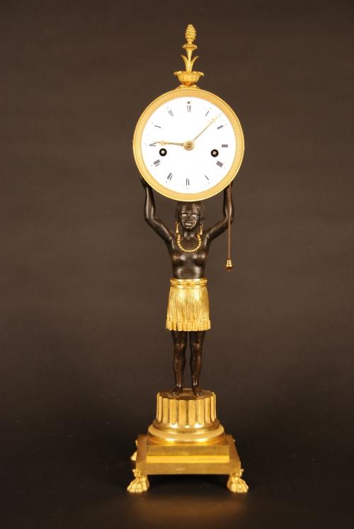 ABS-19 A very fine quality Directoire gilt and patinated bronze clock and matching pair of candelabra &acirc;��Au Jeune N&Atilde;&uml;gre&acirc;�� by Jean-Simon Deverberie.