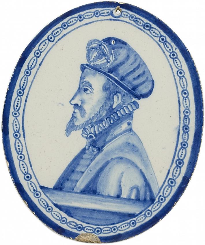 A Small Oval Plaque in Blue and White Delftware