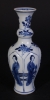 Nice fine blue and white decorated Kangxi vase with long eliza's and flowerpots in lotus shaped moulded panels. Marked: Jade.