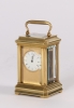 A lovely French miniature brass carriage timepiece, circa 1880