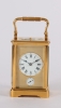 A French gilt brass quarter repeating alarm carriage timepiece circa 1880