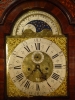 A good and attractive English walnut longcase clock with moonphase, by William Upjohn, circa 1730