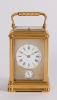 A good French gilt brass quarter repeating travel clock with gorge case, by Margaine, circa 1870