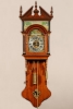 A rare small Dutch Frisian maddered oak Burgomaster wall clock, dated 1836