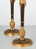 A rare pair of European four-light gilt bronze ‘Directoire’ candlesticks, circa 1810