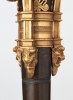 A rare pair of European four-light gilt bronze ‘Directoire’ candlesticks, circa 1810