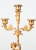 A pair of French bronze ‘Paul and Virginie’ candlesticks, circa 1830
