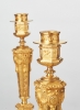A fine pair of French Regency inspired gilt bronze candlesticks, circa 1880