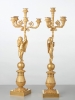 A pair of French bronze five-arm candlesticks with angels, circa 1830