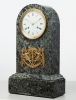 An elegant French green marble arched mantel clock, circa 1830