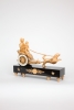 A French empire ormolu and marble chariot mantel clock, circa 1800