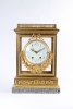 An impressive French Louis XVI-style gilt bronze and marble mantel clock