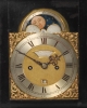 A small English ebonised table clock with moonphase, by Robert Wood, circa 1770
