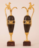 A pair of empire patinated bronze and fire gilded ewers, Circa 1810