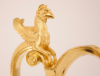A pair of empire patinated bronze and fire gilded ewers, Circa 1810