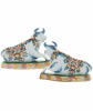 Pair of Polychrome Figures of Recumbent Cows in Dutch Delftware