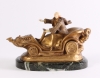 An Art Deco bronze marble and ivory sculpture of a car, circa 1920.