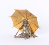 'Seated girl with umbrella', silvered and gilt bronze sculpture, circa 1880.