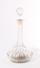 A cut-glass decanter with musical mechanism, circa 1880
