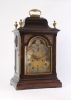 A small English ebonised table clock with moonphase, by Robert Wood, circa 1770