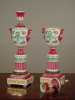 A pair of polychrome porcelain urns 'à double usage', mid 19th Century.