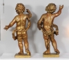 A pair of Dutch giltwood pendant figures of putti, circa 1660