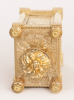 An English engraved gilt brass travel clock, Aubert & Klaftenberger, circa 1860.