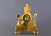 A large French fire-gilt bronze Empire mantel clock Orpheus with its lyre