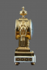A fire-gilt bronze with white marble Louis Seize mantel clock Guenoux à Paris