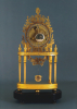 A very fine French Empire skeleton clock in ormolu bronze