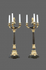 A pair of ormolu and patinated Charles X French four-light candelabres