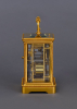 A French gilded travel clock in a Corniche case signed Le Roy & Fils, around 1860