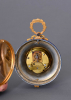 A small French Louis XVI style Oeil de Boeuf clock and Aneroid barometer, around 1840