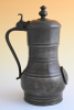 A pewter guild jug