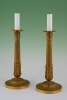 A pair of Empire style candle sticks