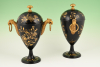 A pair of Dutch lacquered pewter chestnut vases.