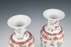 A pair of Chinese porcelain Famille Rose baluster Vases.