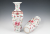 A pair of Chinese porcelain Famille Rose baluster Vases.