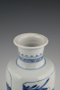 A Chinese porcelain rouleau vase