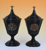 A pair of lacquered tin chestnut vases.